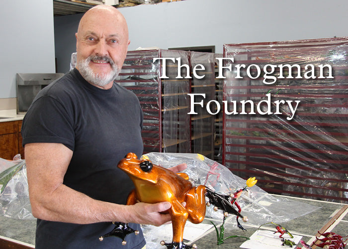 Tim Cotterill showing one of his large bronze frog sculptures